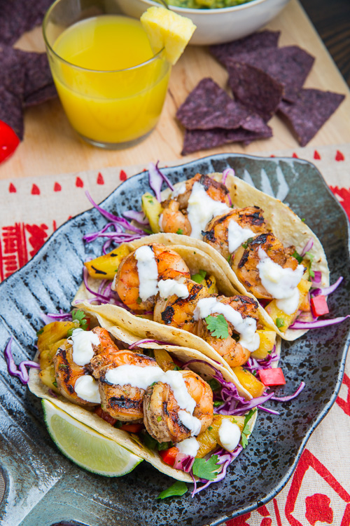 Jerk Shrimp Tacos with Pineapple Salsa, Slaw and Pina Colada Crema Jerk Shrimp Tacos with Pineapple Salsa, Slaw and Pina Colada Crema