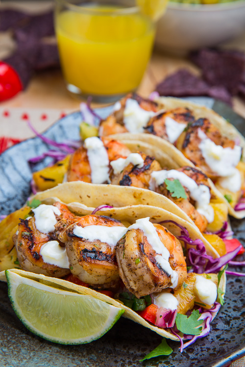 Jerk Shrimp Tacos with Pineapple Salsa, Slaw and Pina Colada Crema Jerk Shrimp Tacos with Pineapple Salsa, Slaw and Pina Colada Crema