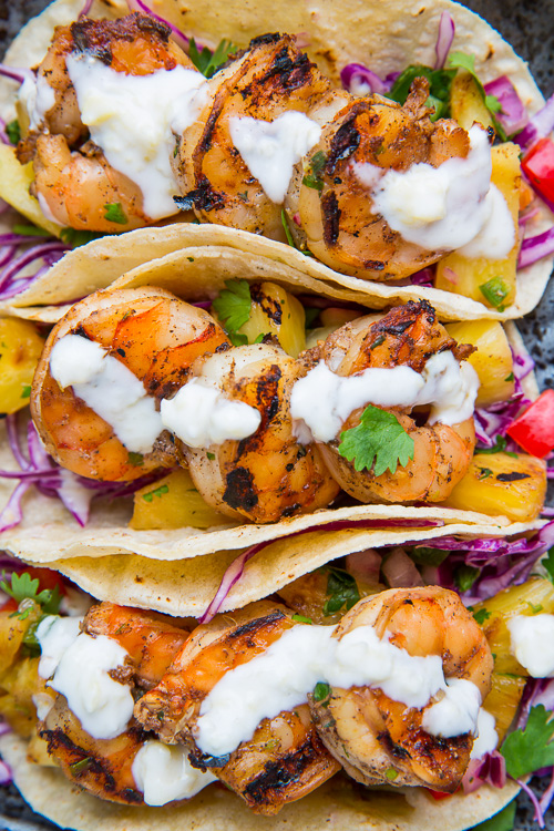 Jerk Shrimp Tacos with Pineapple Salsa, Slaw and Pina Colada Crema Jerk Shrimp Tacos with Pineapple Salsa, Slaw and Pina Colada Crema