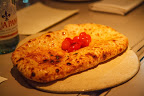 Flat Bread topped with Garlic Butter and Roasted Tomatoes Flat Bread topped with Garlic Butter and Roasted Tomatoes