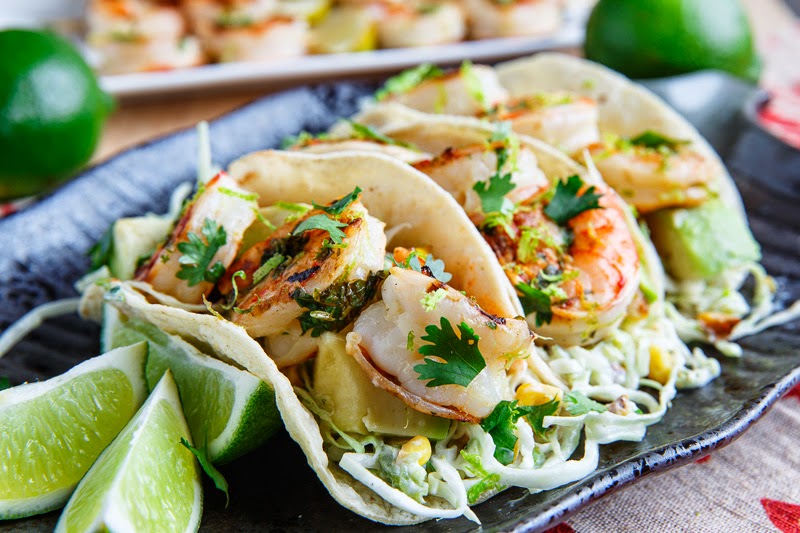 Cilantro Lime Shrimp Tacos with Roasted Corn Slaw and Roasted Jalapeno Crema Cilantro Lime Shrimp Tacos with Roasted Corn Slaw and Roasted Jalapeno Crema