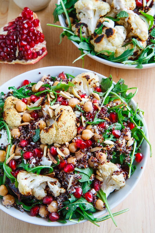 Roasted Cauliflower and Chickpea Quinoa and Arugula Salad with Almonds, Pomegranate and Feta in a Lemony Tahini Dressing Roasted Cauliflower and Chickpea Quinoa and Arugula Salad with Almonds, Pomegranate and Feta in a Lemony Tahini Dressing