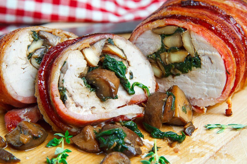 Bacon Wrapped, Mushroom and Spinach Stuffed Pork Tenderloin in a Creamy Dijon Goat Cheese Sauce Bacon Wrapped, Mushroom and Spinach Stuffed Pork Tenderloin in a Creamy Dijon Goat Cheese Sauce