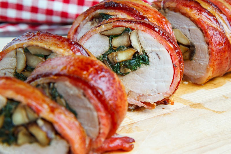 Bacon Wrapped, Mushroom and Spinach Stuffed Pork Tenderloin in a Creamy Dijon Goat Cheese Sauce Bacon Wrapped, Mushroom and Spinach Stuffed Pork Tenderloin in a Creamy Dijon Goat Cheese Sauce