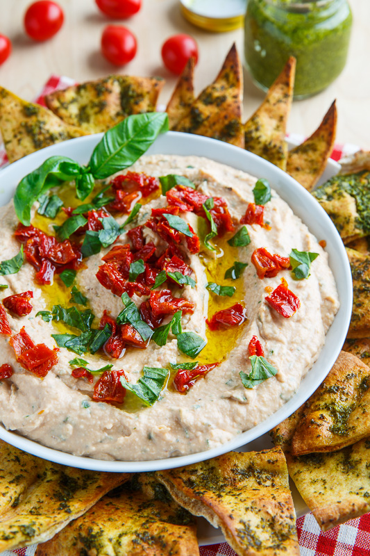 Cheesy Margherita Pizza Hummus with Pesto Pita Chips Cheesy Margherita Pizza Hummus with Pesto Pita Chips
