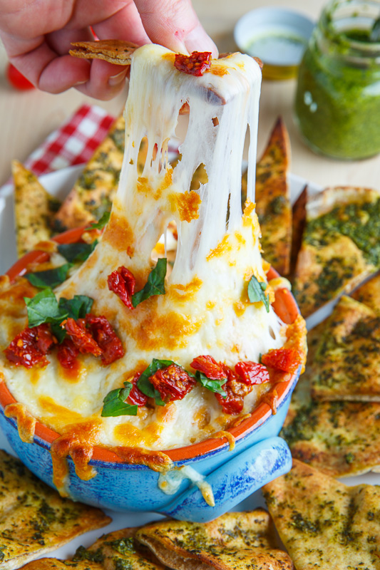 Cheesy Margherita Pizza Hummus with Pesto Pita Chips Cheesy Margherita Pizza Hummus with Pesto Pita Chips