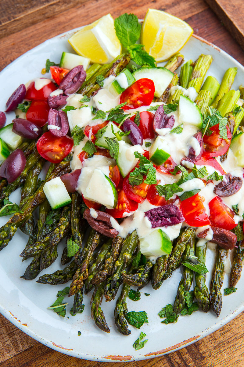 Grilled Asparagus in Lemon Maple Tahini with Tomatoes and Cucumbers Grilled Asparagus in Lemon Maple Tahini with Tomatoes and Cucumbers