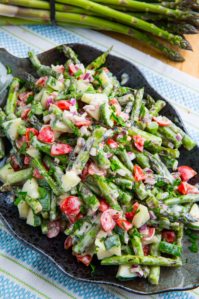 Grilled Asparagus in Lemon Maple Tahini with Tomatoes and Cucumbers Grilled Asparagus in Lemon Maple Tahini with Tomatoes and Cucumbers