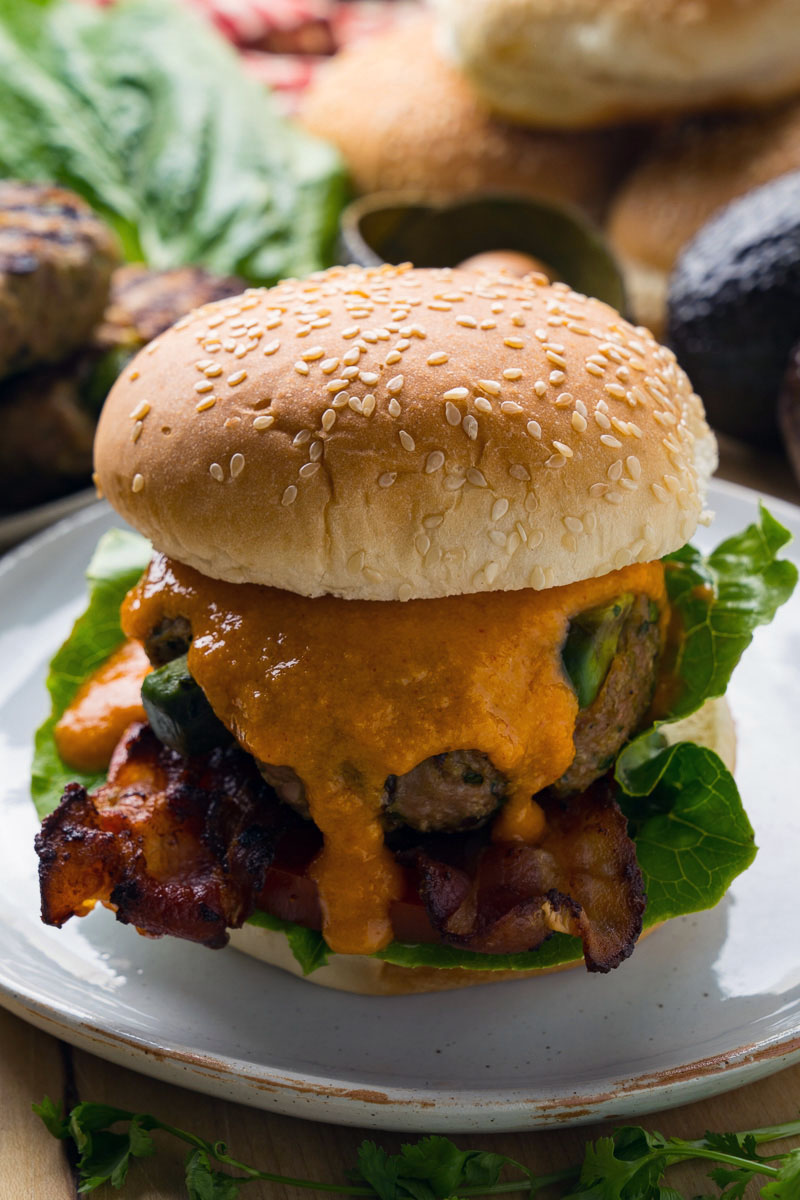 Avocado Chicken Burgers with Gochujang Nacho Cheese Sauce and Bacon Avocado Chicken Burgers with Gochujang Nacho Cheese Sauce and Bacon
